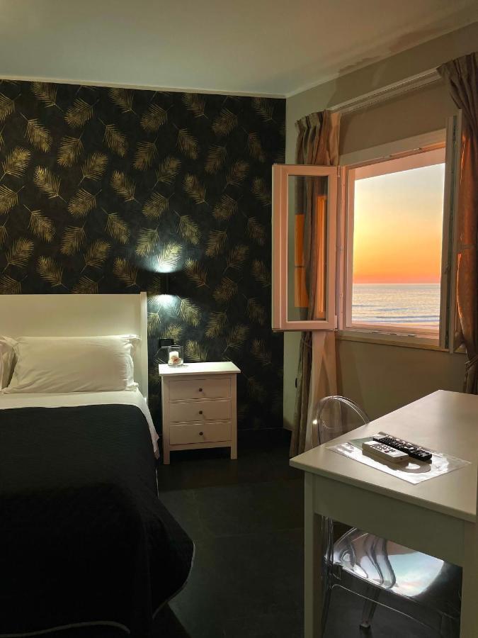 Aldiva Rooms Torvaianica Bagian luar foto